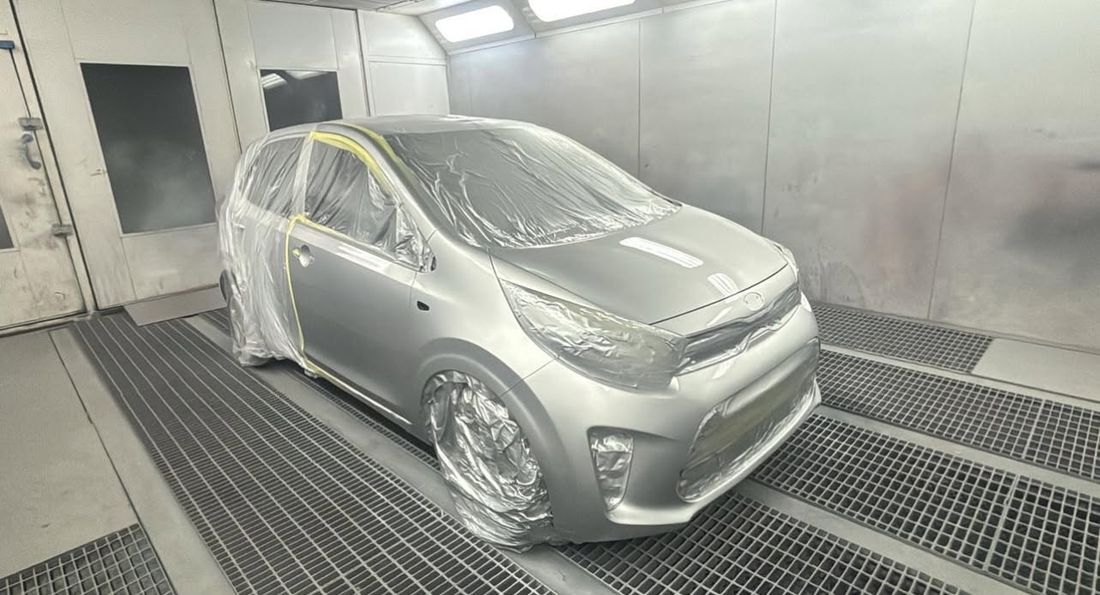 A Kia Picanto masked up for a respray at Mobile Dent Pro
